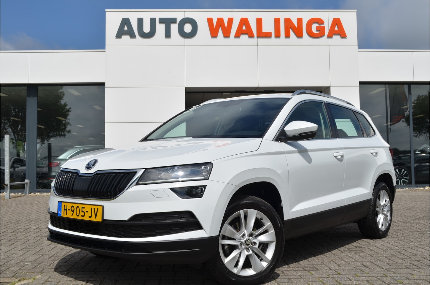 Skoda Karoq - 1.0 TSI Business Edition Carplay | a.Camera | LED koplampen | Climate | Cruise | LMV | NL - AutoWereld.nl