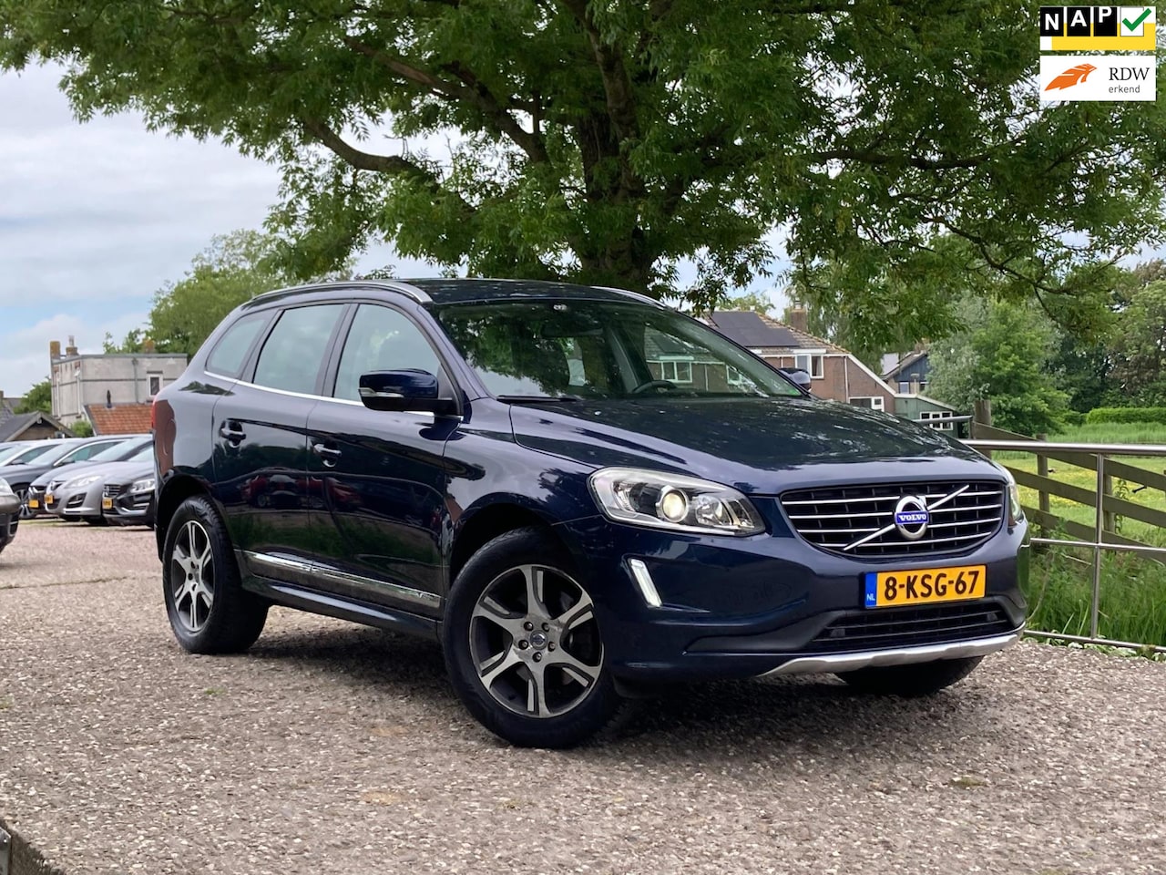 Volvo XC60 - 2.4 D5 AWD Summum | Automaat + Leder met memory + Navi nu € 14.975,-!!! - AutoWereld.nl