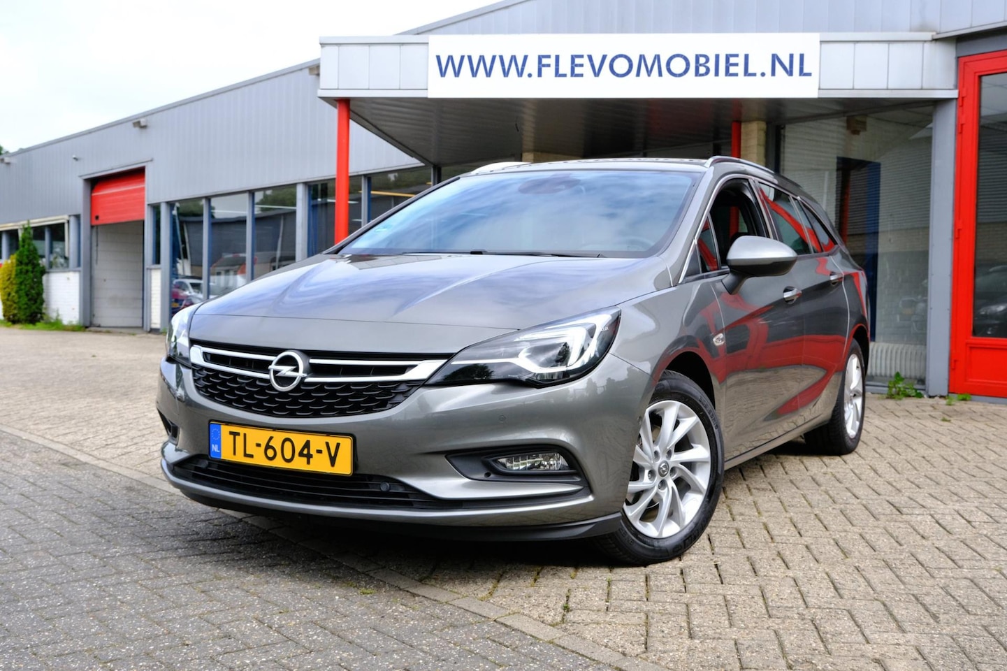 Opel Astra Sports Tourer - 1.4 150pk Innovation Aut. Navi|Cam|Half Leder|PDC - AutoWereld.nl