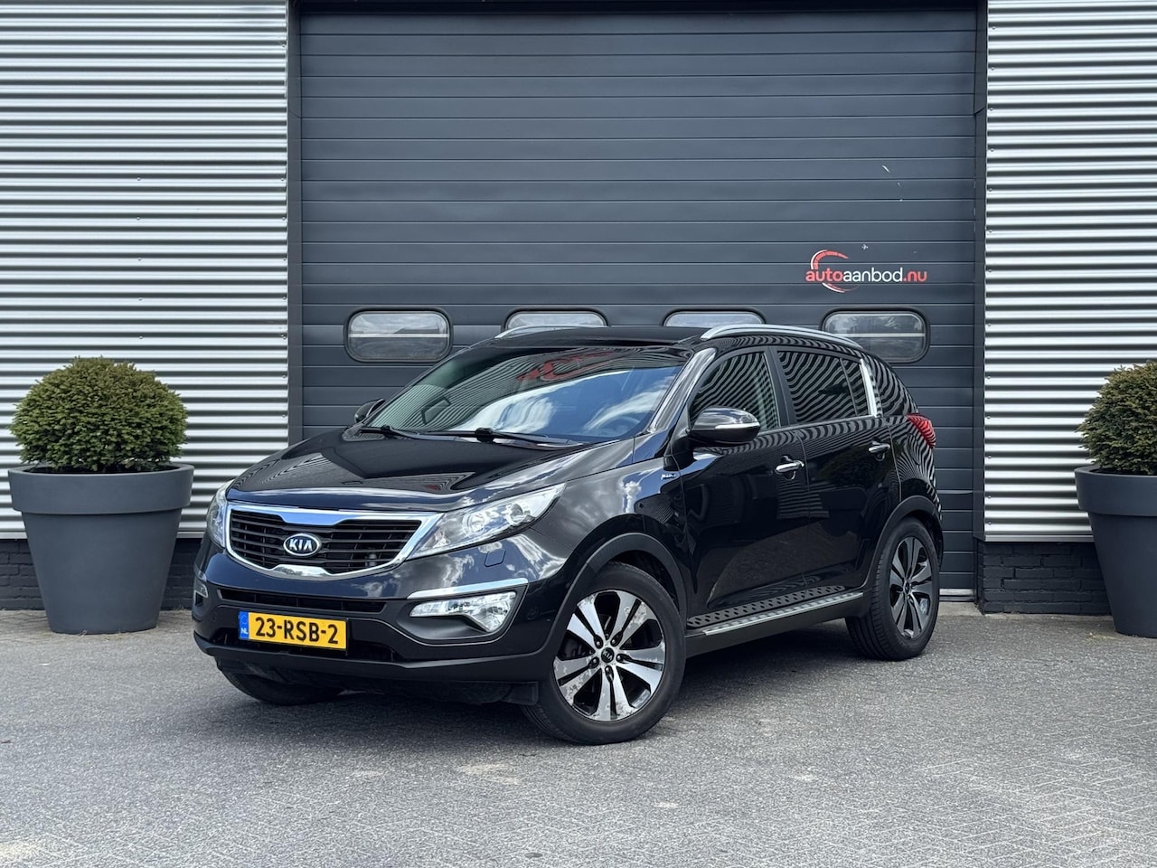 Kia Sportage - 2.0 CRDI X-clusive 4wd | Panoramdak | Camera | Navigatie | Lederen Bekleding | Stoelverwar - AutoWereld.nl