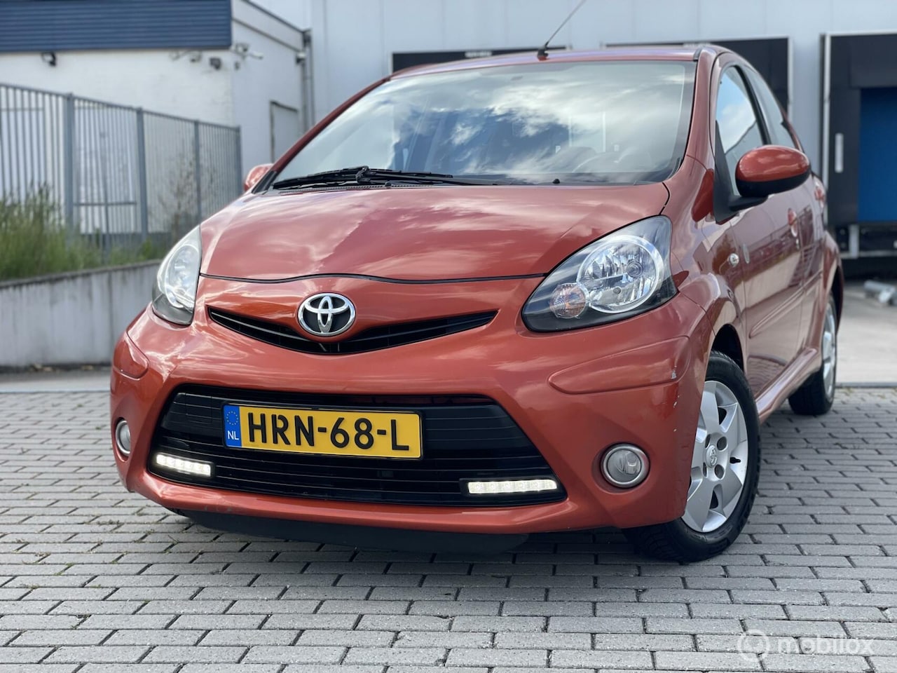 Toyota Aygo - 1.0-12V Airco, Elec Ramen, Alu , ORANGE EDITION - AutoWereld.nl