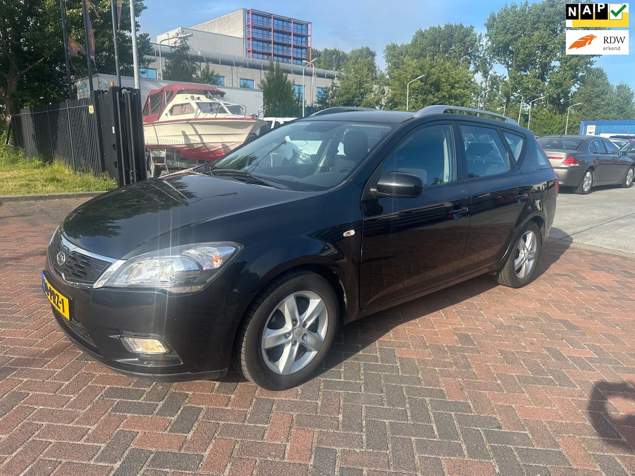 Kia Cee'd Sporty Wagon - 1.4 CVVT Seven Airco! Zwart! 180DKM NAP! 2011 - AutoWereld.nl