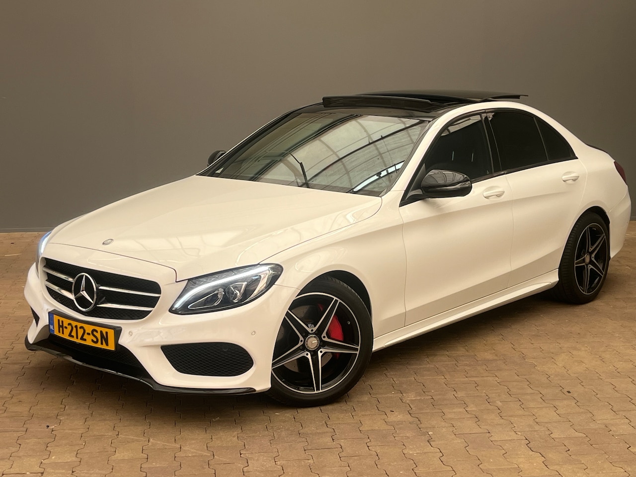 Mercedes-Benz C-klasse - 300 Prestige | Pano | Navi | Clima | Cruise | AMG Styling | | LED koplampen | Lichtmetalen - AutoWereld.nl