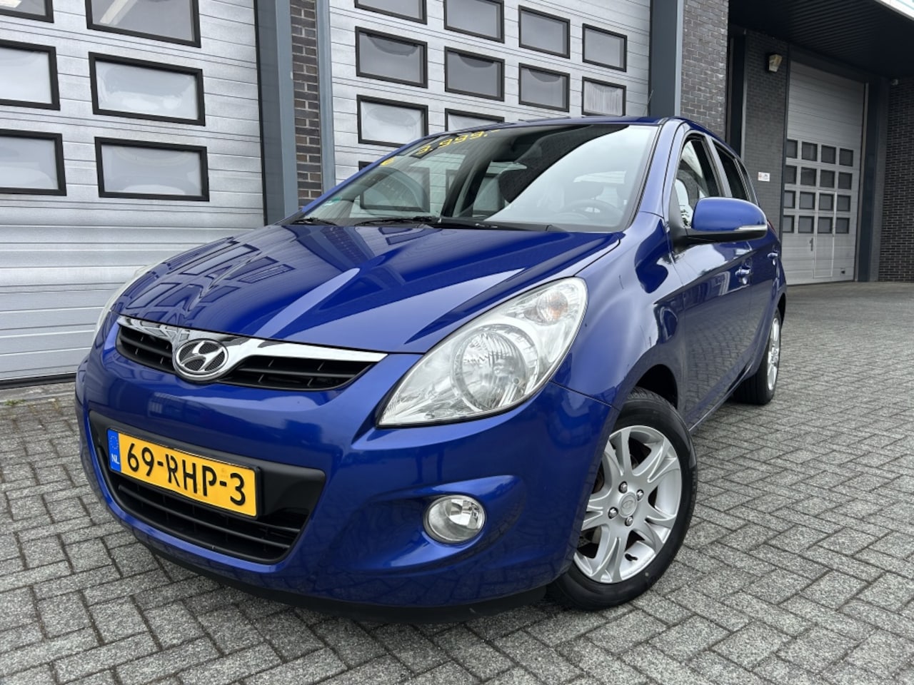 Hyundai i20 - 1.2i i-Motion 5DRS Airco*Navi Topauto! - AutoWereld.nl