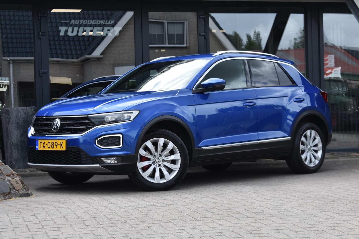 Volkswagen T-Roc - 1.0 TSI Sport | VIRTUAL COCKPIT | TREKHAAK | CAMERA | NAP | DAB - AutoWereld.nl