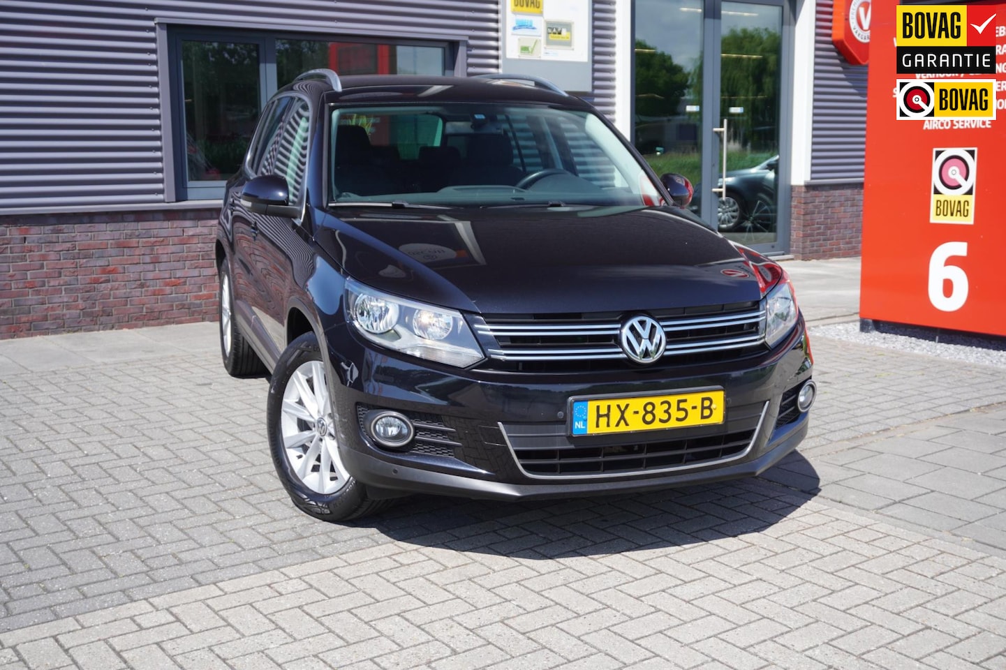 Volkswagen Tiguan - 1.4 TSI Sport&Style / Dealer onderhouden / Orgineel nederlands - AutoWereld.nl