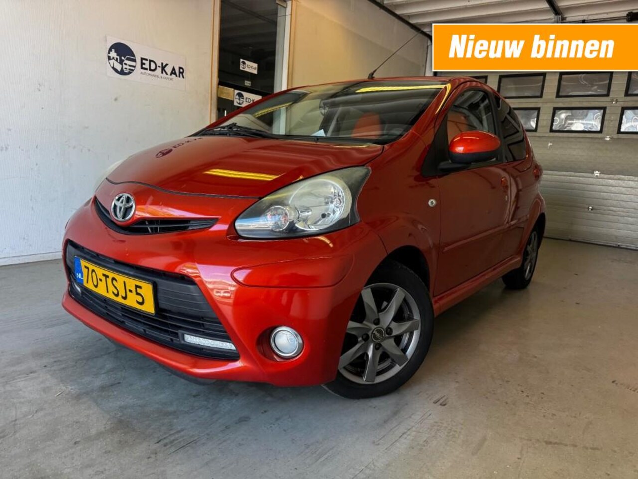 Toyota Aygo - 1.0 VVT-i Dynamic Orange AIRCO 5DRS NAP APK 5-2026 - AutoWereld.nl