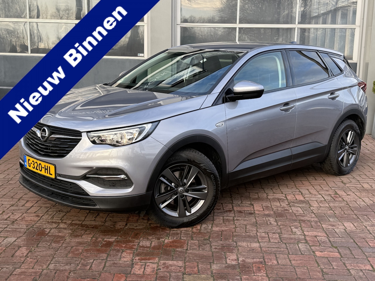 Opel Grandland X - 1.2 Turbo Business Executive |Apple Carplay|handbak|Cruise|Navi|Airco|Trekhaak - AutoWereld.nl