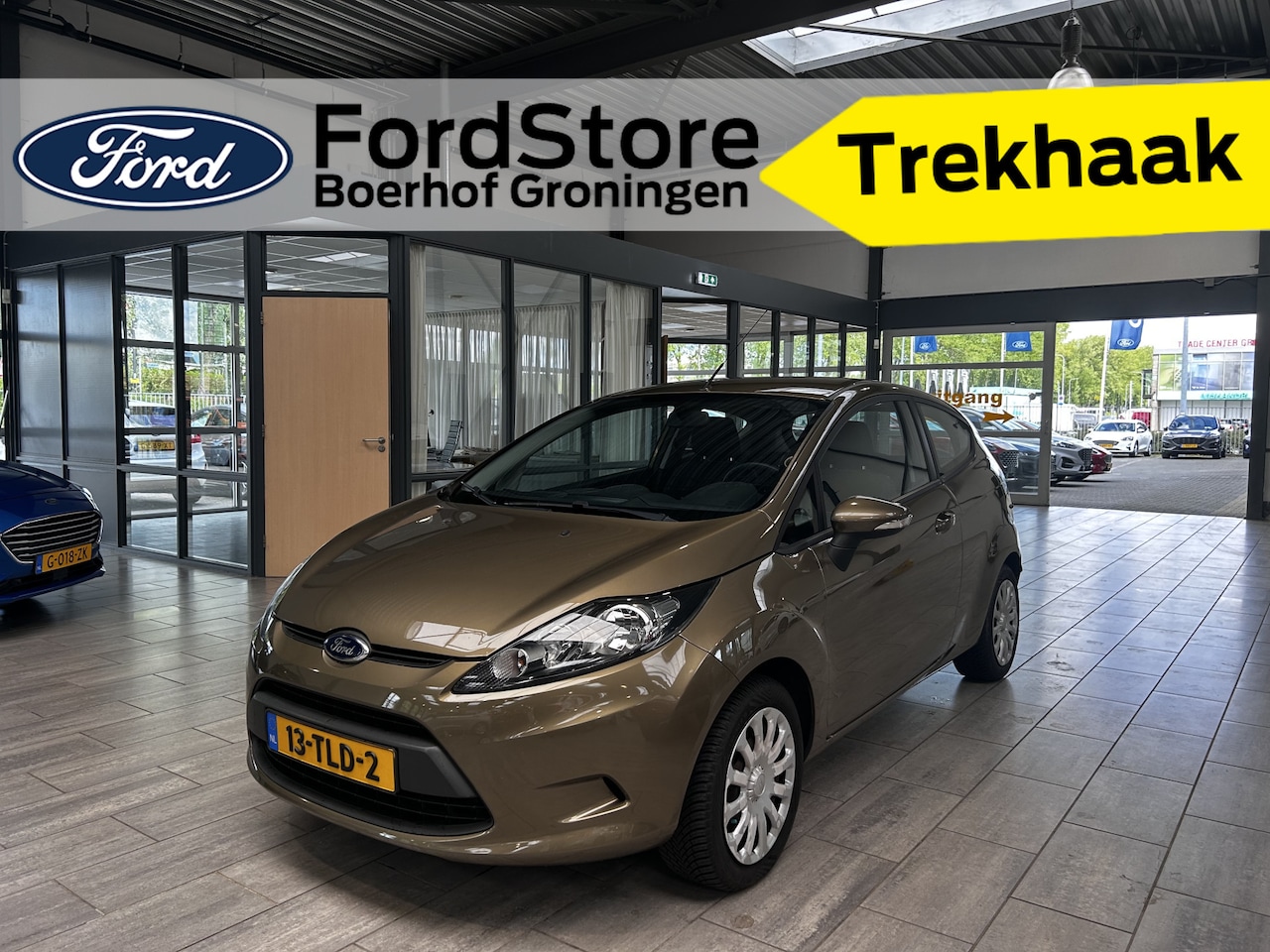 Ford Fiesta - 1.25 60pk Ghia | Trekhaak | Cruise control | Airco | All-Season banden | - AutoWereld.nl