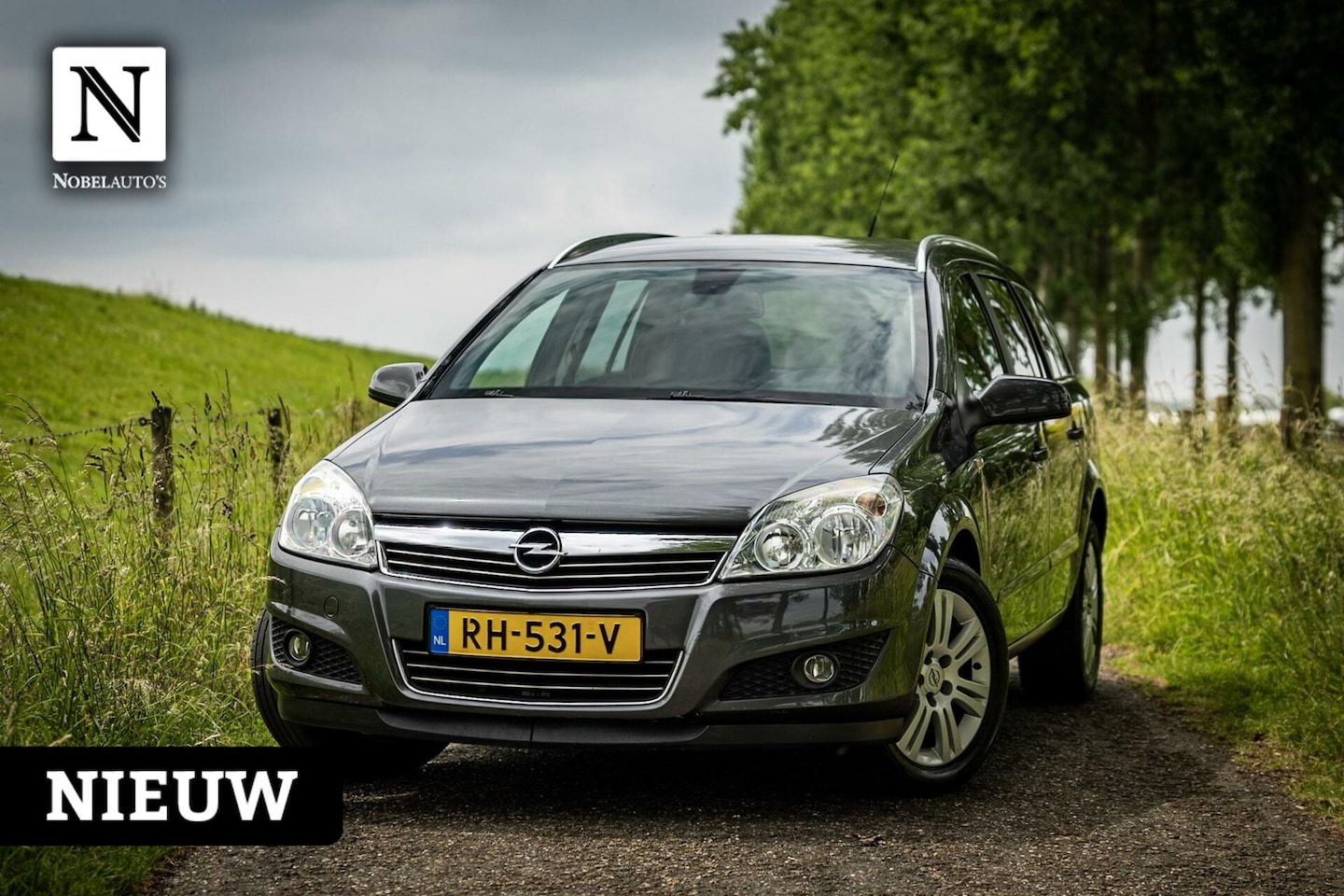 Opel Astra Wagon - 1.6 Business | Navi | Trekhaak | Airco - AutoWereld.nl