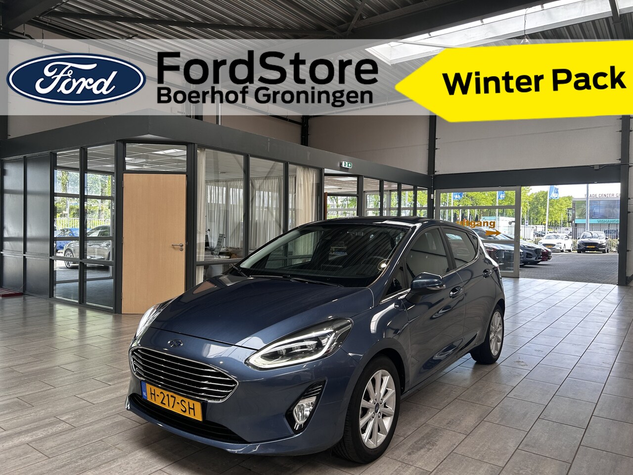 Ford Fiesta - EcoBoost 95pk Titanium | Winter pack | Clima  | Cruise | Draadloos laden | Parkeersens. ac - AutoWereld.nl