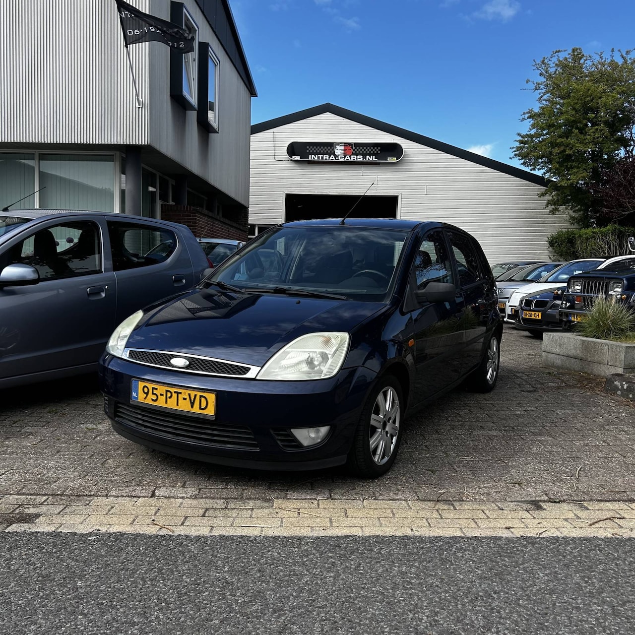 Ford Fiesta - 1.4-16V Ghia Zeer nette en goed rijdende Ford Fiesta. Apk t/m 02-12-2025. - AutoWereld.nl