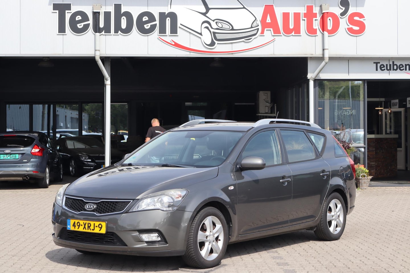 Kia Cee'd Sporty Wagon - 1.4 CVVT Navigator Plus Pack Navigatie, Trekhaak, Cruise control, Climate control, Lichtme - AutoWereld.nl