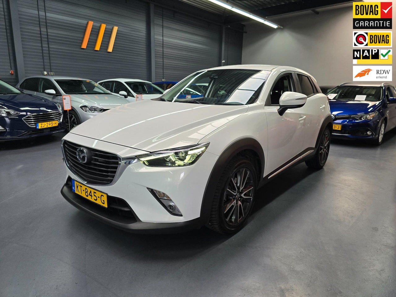 Mazda CX-3 - 2.0 SkyActiv-G 120 GT-M Line LEDER HEAD-UP CAMERA NAP NL AUTO - AutoWereld.nl