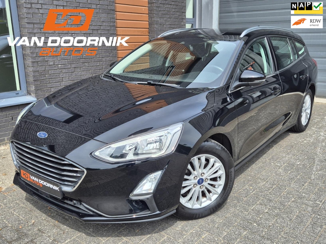 Ford Focus Wagon - 1.0 EcoBoost Titanium Business Navigatie/Trekhaak/APK 2027! - AutoWereld.nl