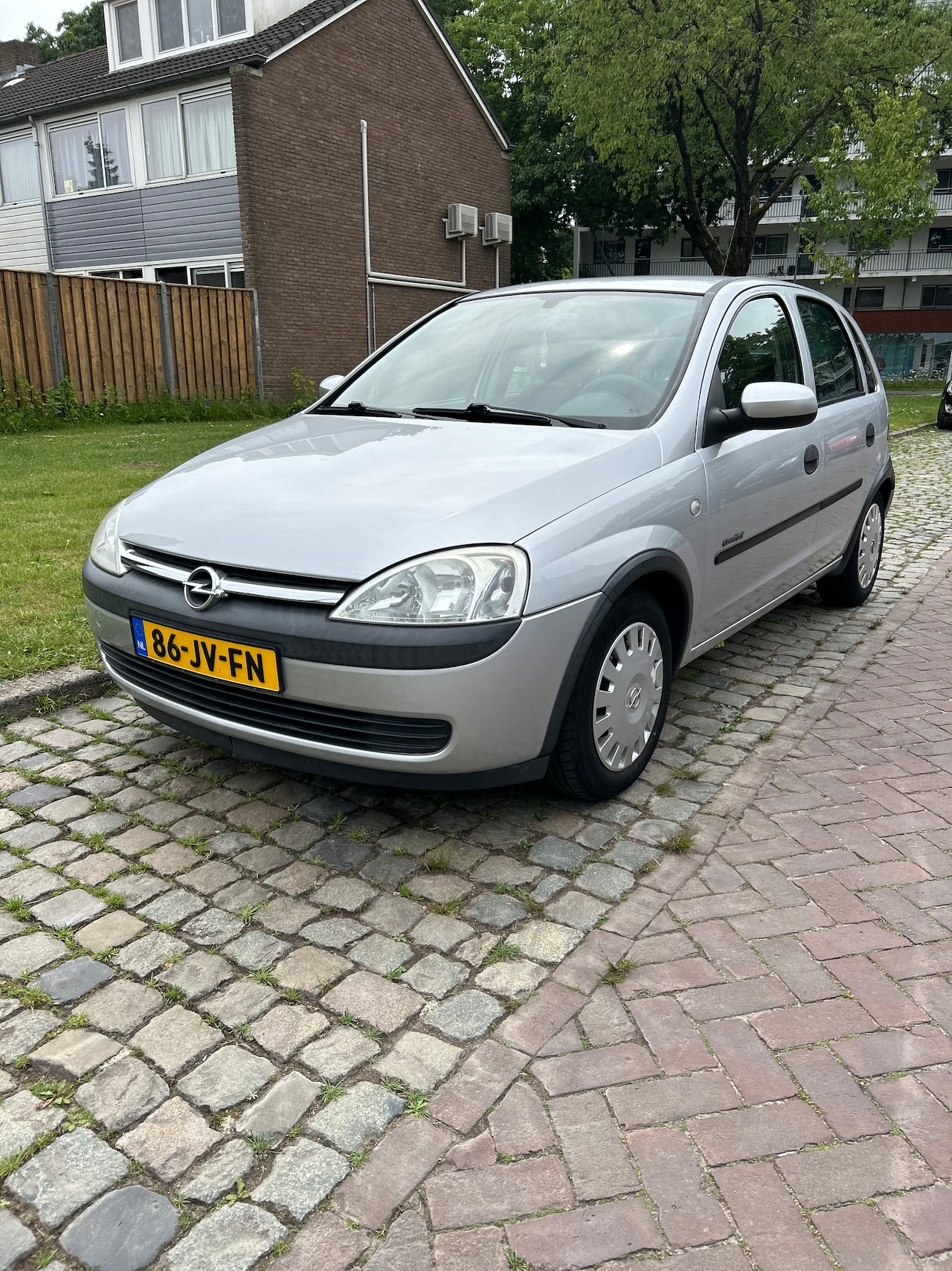 Opel Corsa - 1.2-16V Comfort 2de eigenaar - AutoWereld.nl