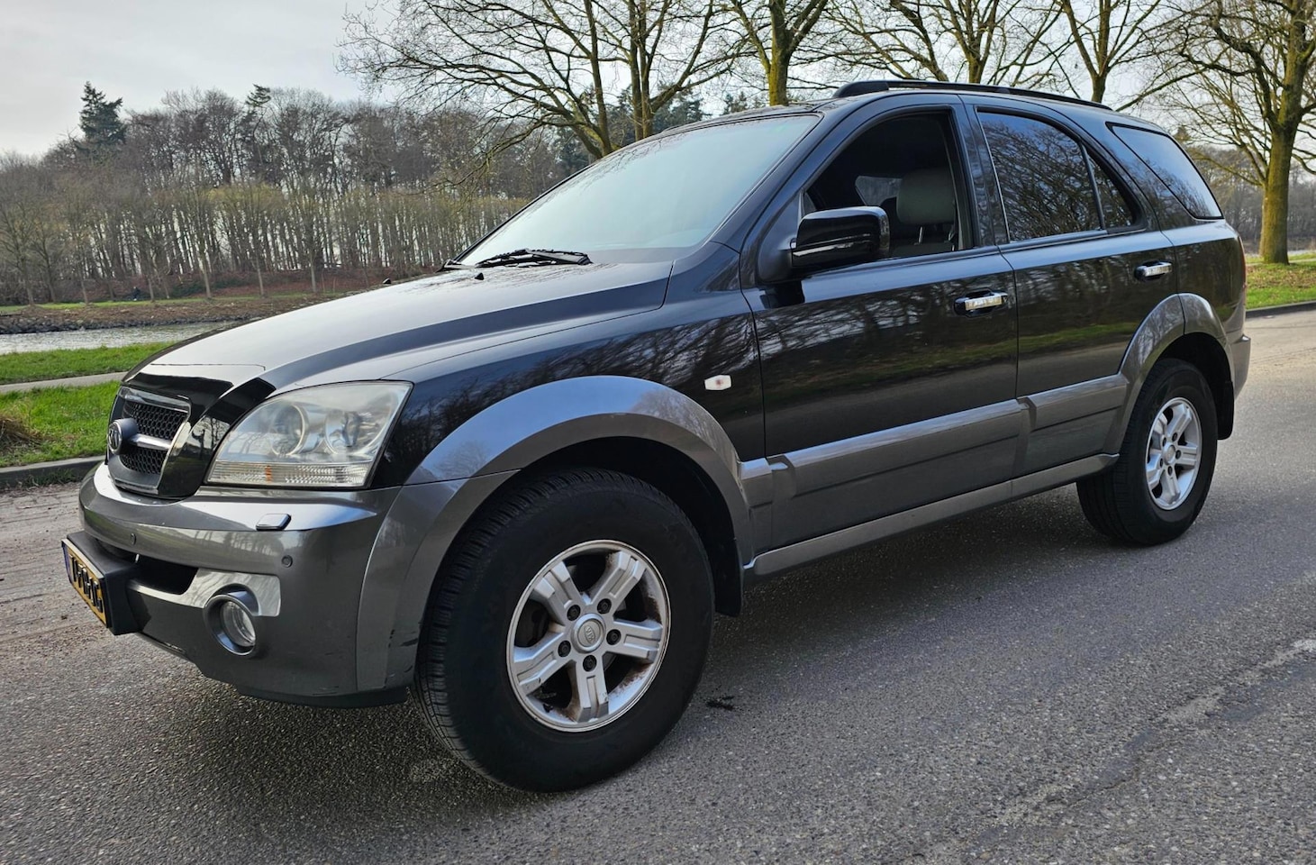 Kia Sorento - 3.5 V6 EX Luxe Automaat TUSSENBAK MAAKT GELUID - AutoWereld.nl