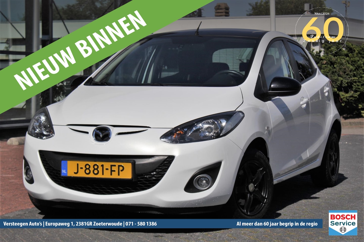 Mazda 2 - 1.3 84pk 5D GT-Navigator Black & White edition - AutoWereld.nl