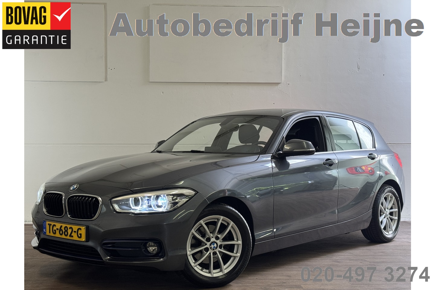 BMW 1-serie - 118i EXECUTIVE AUT. NAVI/LED/PDC - AutoWereld.nl
