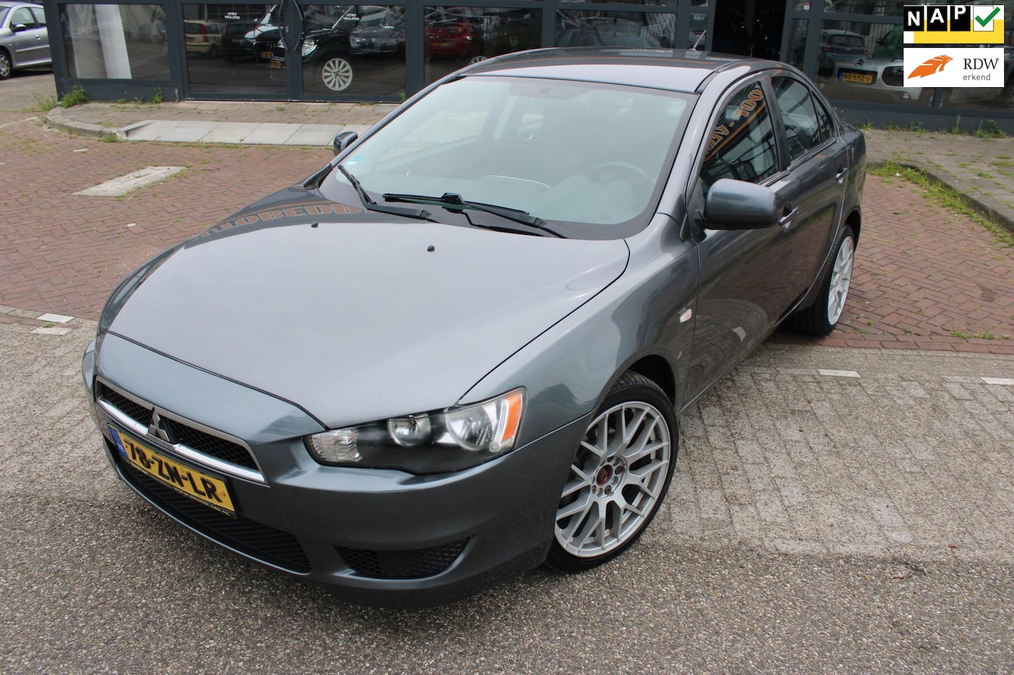 Mitsubishi Lancer Sports Sedan - 1.8 Invite | Airco | Navi | Carplay | - AutoWereld.nl