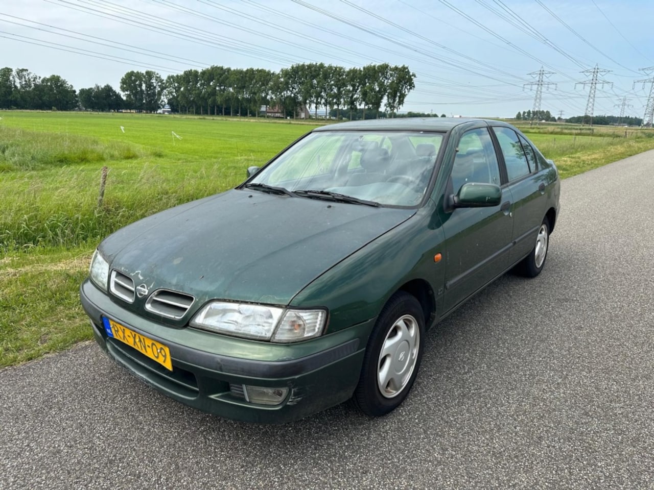 Nissan Primera - 2.0 SLX Drive II 2.0 SLX Drive II - AutoWereld.nl