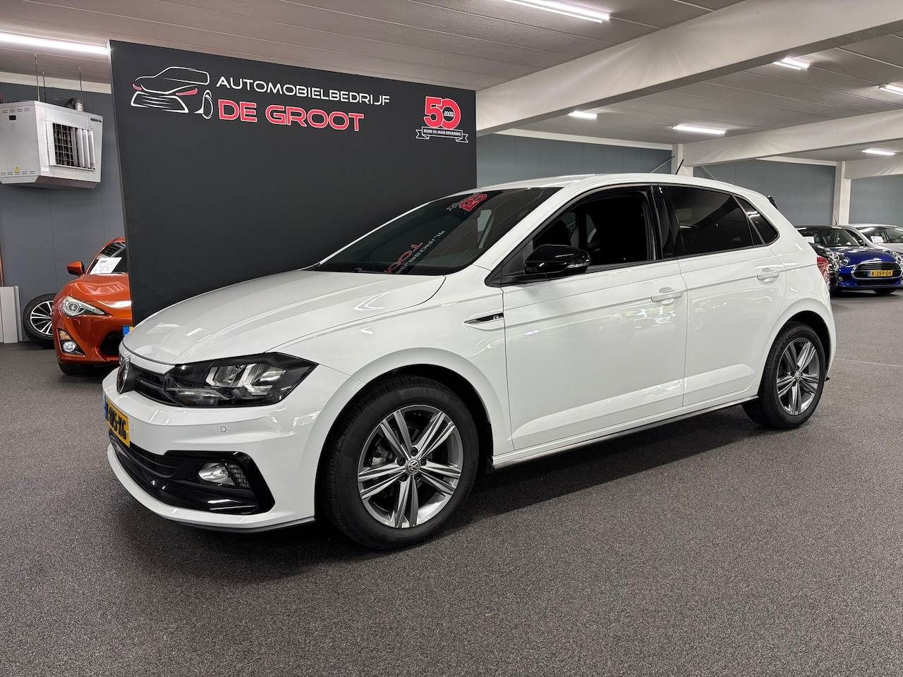 Volkswagen Polo - 1.0 TSI Highline Business R / NL-auto, Automaat, Navi, Airco - AutoWereld.nl