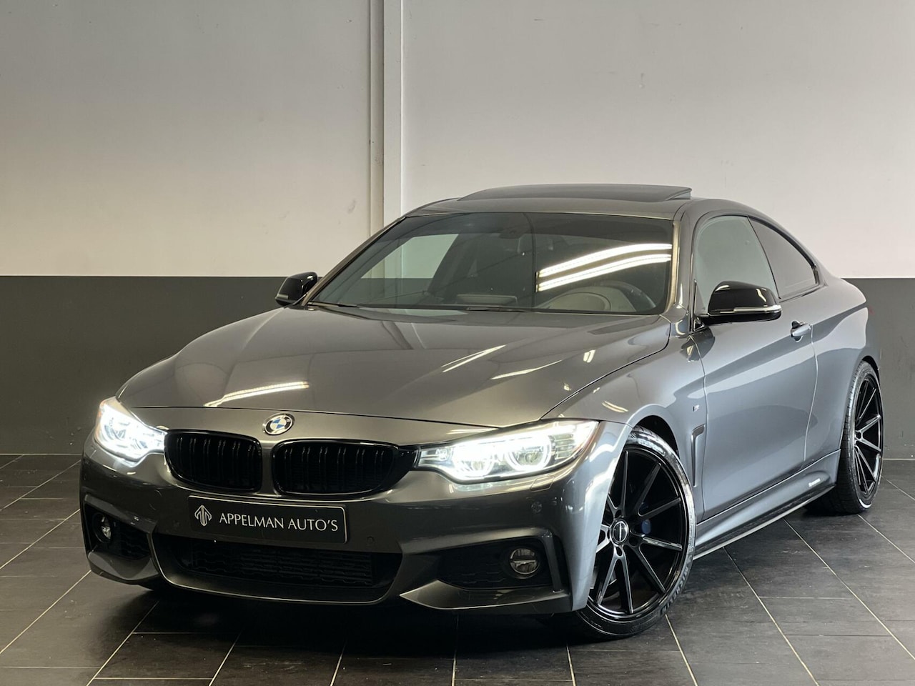 BMW 4-serie Coupé - 435i xDrive High Executive | HUD | Schuifdak | H&K | M-Sport | - AutoWereld.nl