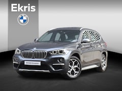 BMW X1 - xDrive20i | High Executive | xLine | Orange Edition | Panodak | Trekhaak | Head-Up | Sport