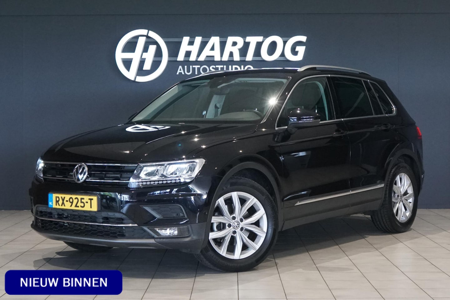 Volkswagen Tiguan - 1.4 TSI ACT Highline AUT. + CAMERA / TREKHAAK - AutoWereld.nl