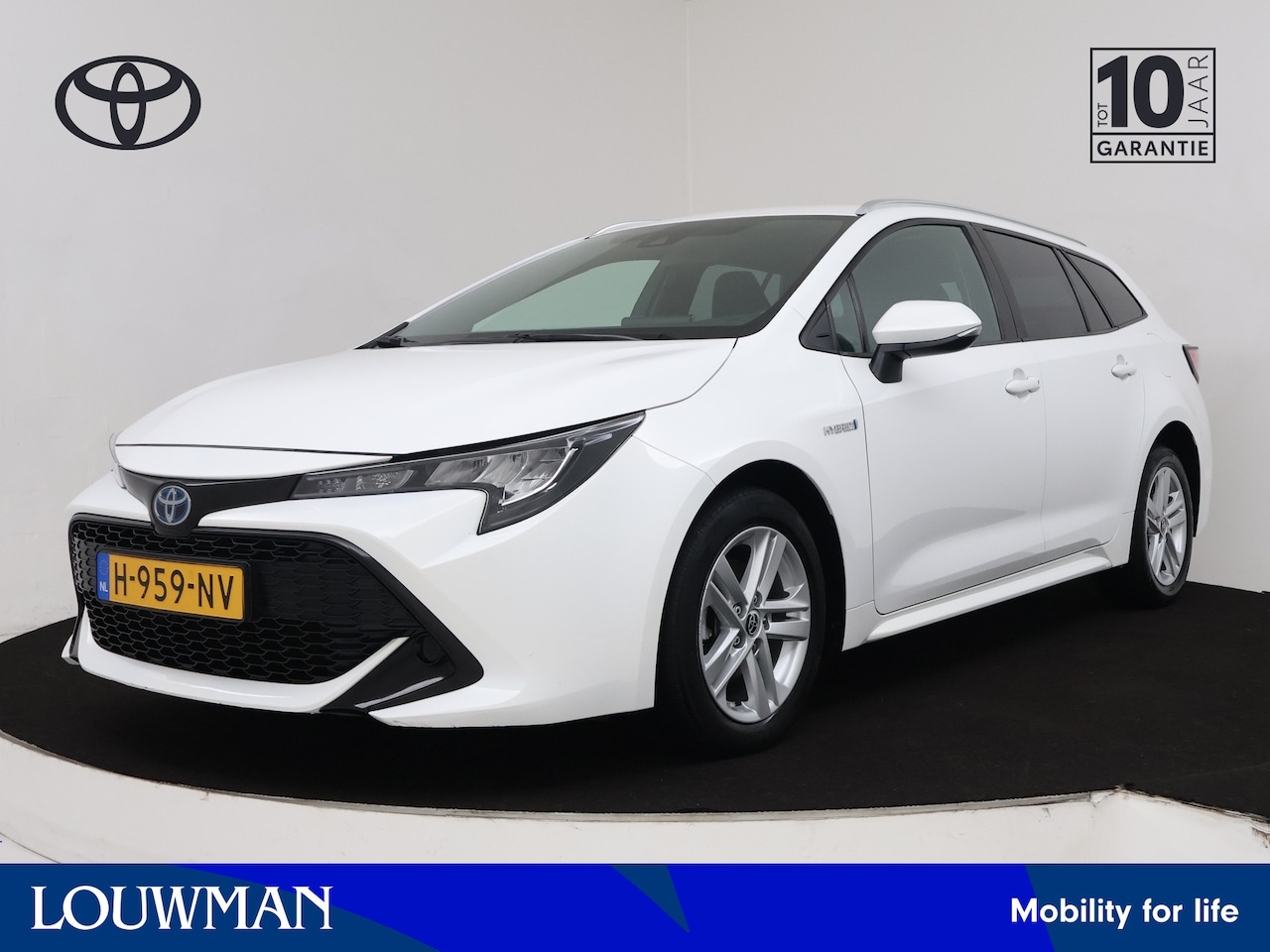 Toyota Corolla Touring Sports - 1.8 Hybrid Active | Parkeersensoren | - AutoWereld.nl