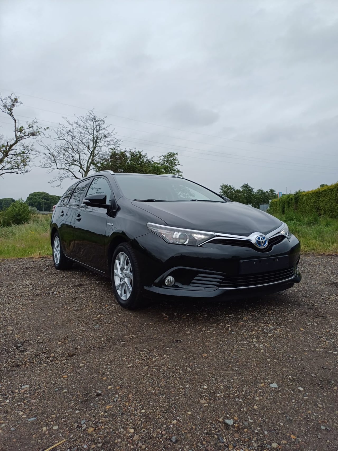 Toyota Auris Touring Sports - 1.8 Hybrid Comfort - AutoWereld.nl