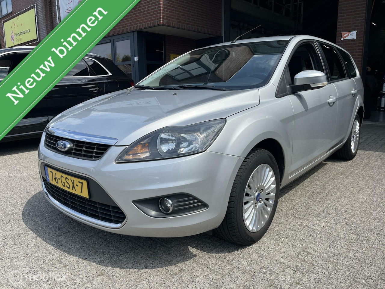 Ford Focus Wagon - 1.6 Titanium TREKHAAK*CLIMA*PDC*CRUISE* - AutoWereld.nl