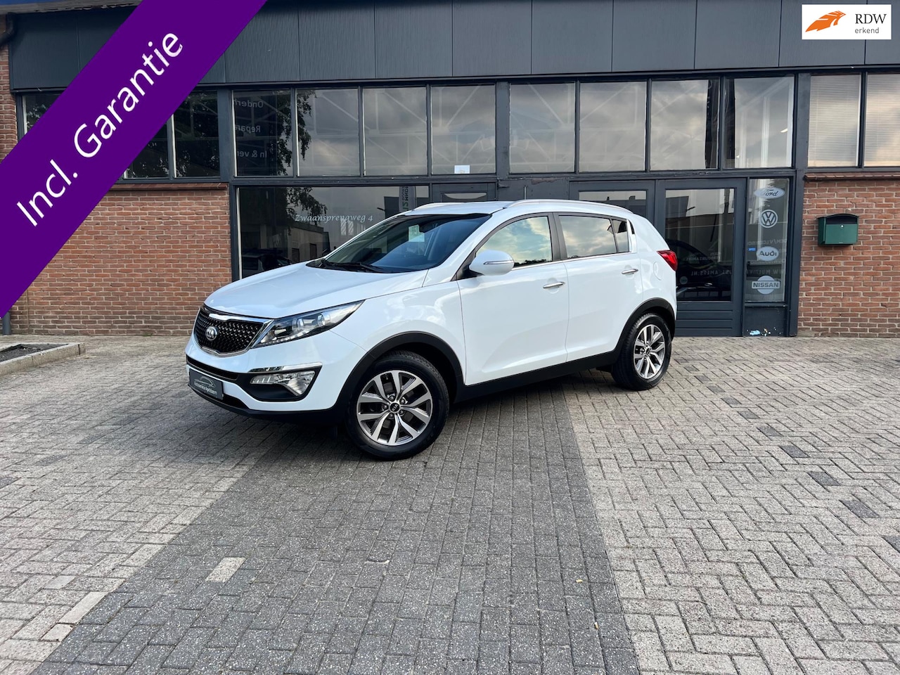 Kia Sportage - 1.6 GDI World Cup Edition 1.6 GDI World Cup Edition, Airco, Navi, Leder - AutoWereld.nl
