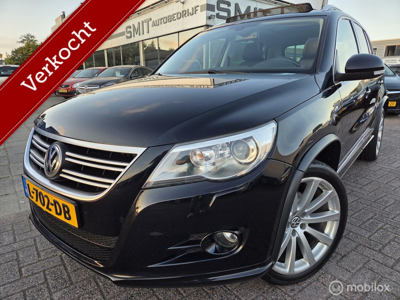 Volkswagen Tiguan - 2.0 TSI Track&Field 4Motion R-Line Pano - AutoWereld.nl