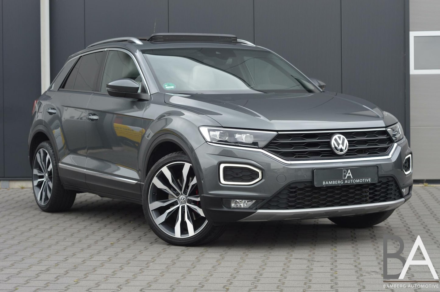 Volkswagen T-Roc - 2.0 TSI 4Motion Sport|leder|pano|DAB|ACC - AutoWereld.nl
