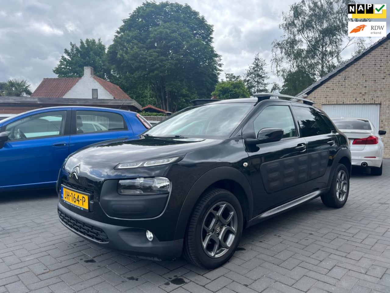 Citroën C4 Cactus - 1.2 PureTech Shine CAMERA/NAVI/AIRCO/CRUISE CT/1STE EIGENAAR - AutoWereld.nl