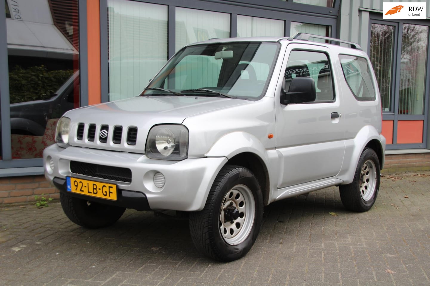 Suzuki Jimny - 1.3 JLX AUTOMAAT Trekhaak - AutoWereld.nl