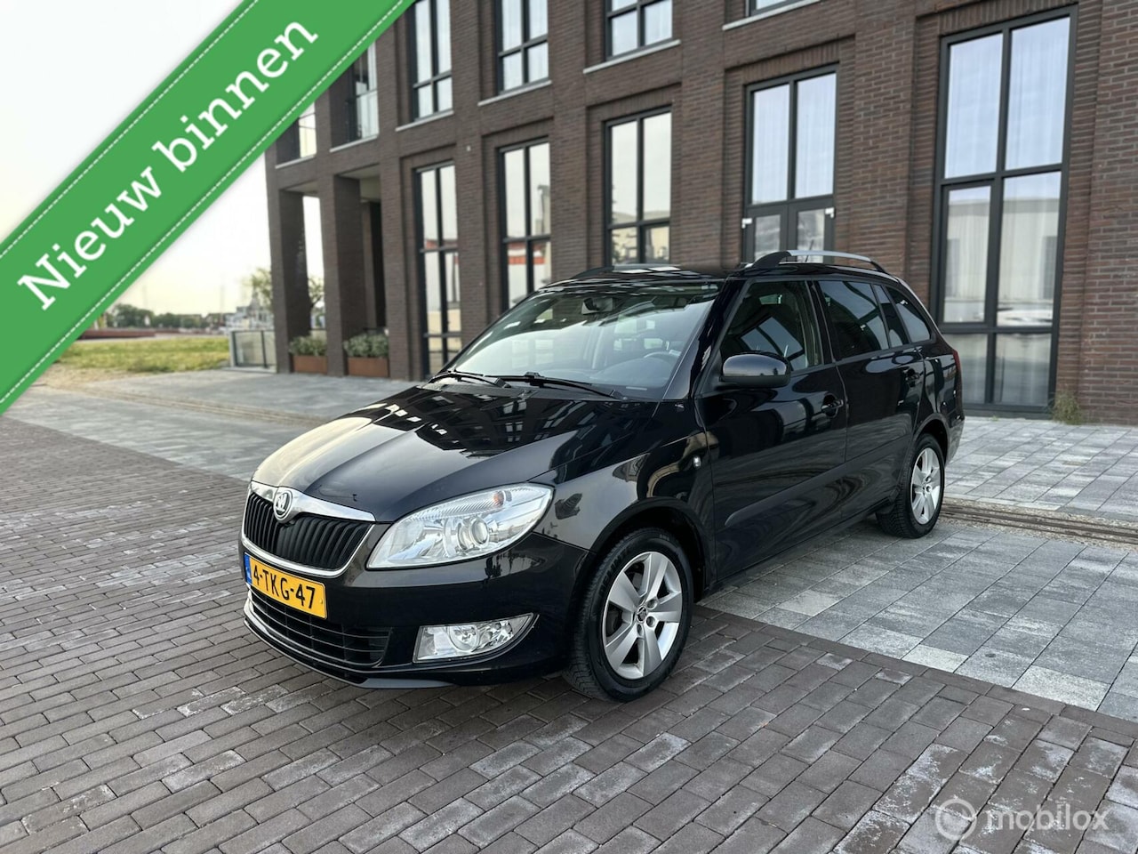 Skoda Fabia Combi - 1.2 TSI Monte Carlo Cruise Navigatie Airco - AutoWereld.nl