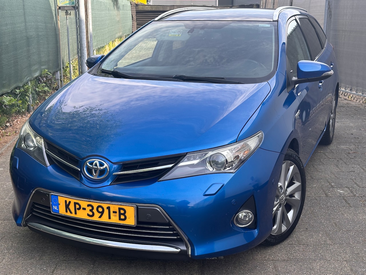 Toyota Auris Touring Sports - 1.8 Hybrid Executive executive - AutoWereld.nl
