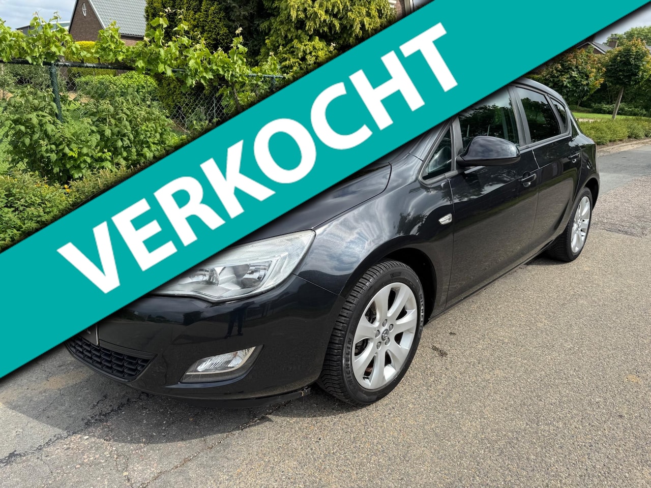 Opel Astra - 1.4 Turbo Edition Airco Navi Cruise Trekhaak - AutoWereld.nl