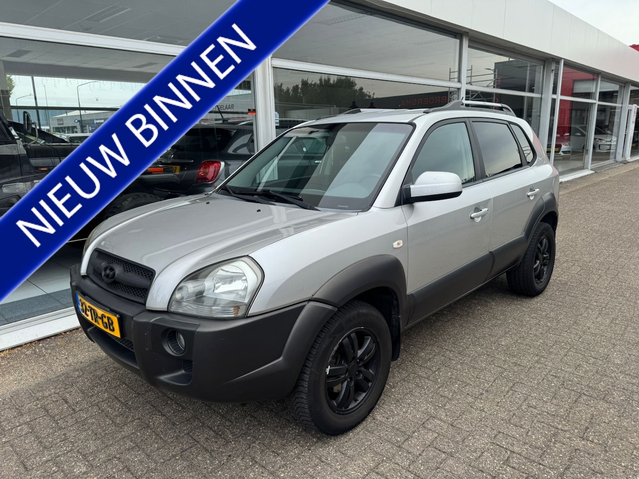Hyundai Tucson - 2.0i Style Premium | Trekhaak | Elektrische ramen | Cruise control | Airco | APK tot 26-01 - AutoWereld.nl