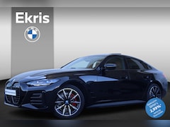 BMW i4 - eDrive40 High Executive M Sportpakket Pro/ Stuurverwarming/ Elektrische Trekhaak/ Comfort