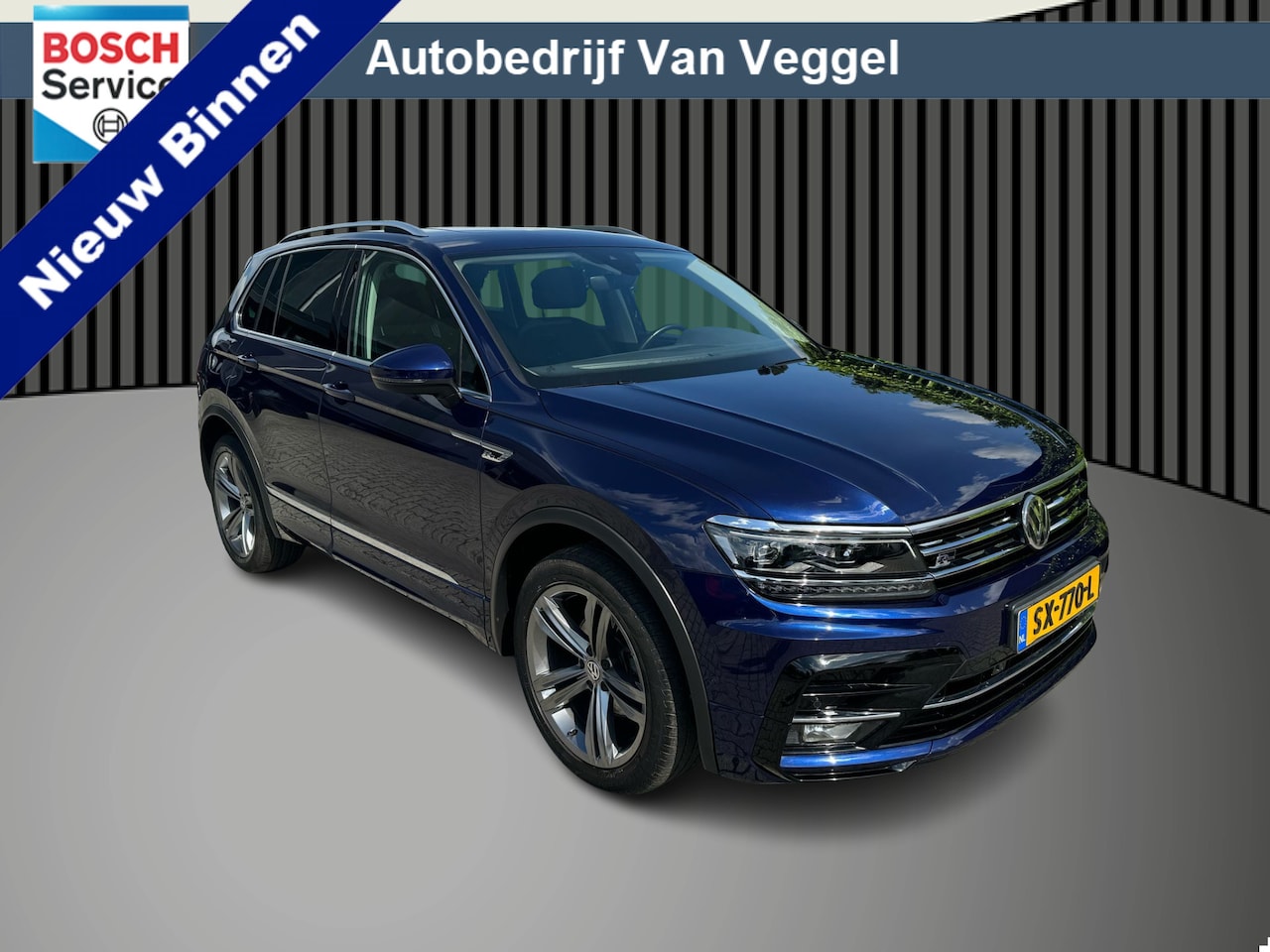 Volkswagen Tiguan - 1.4 TSI 4Motion R line virtual cockpit, trekhaak, pano - AutoWereld.nl