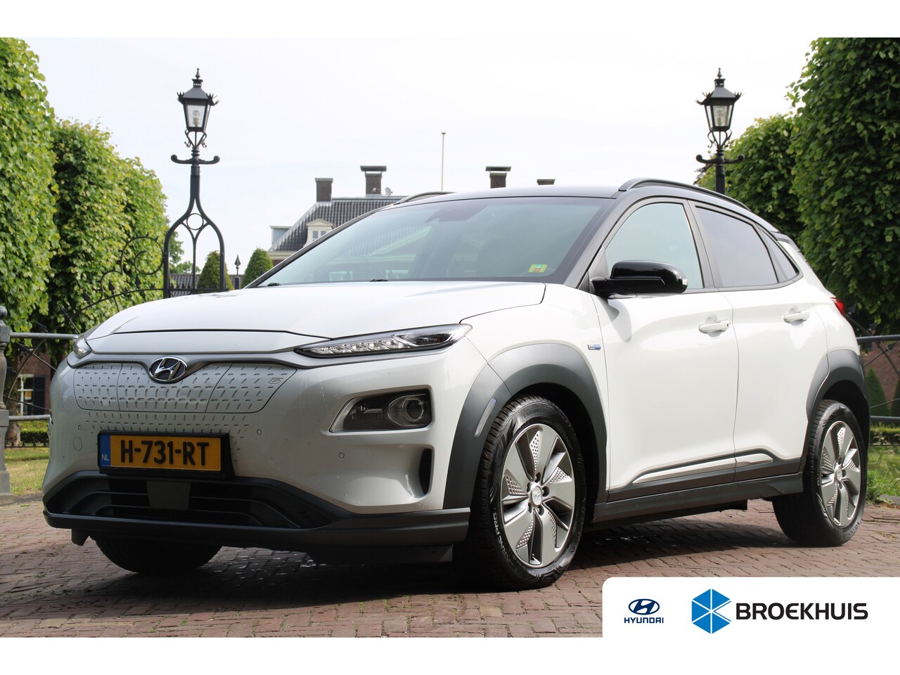 Hyundai Kona Electric - EV Premium 64 kWh | LEDER | CAMERA | ADATIPVE CRUISE | STOELVERW + VERKOELING! | HEAD-UP | - AutoWereld.nl