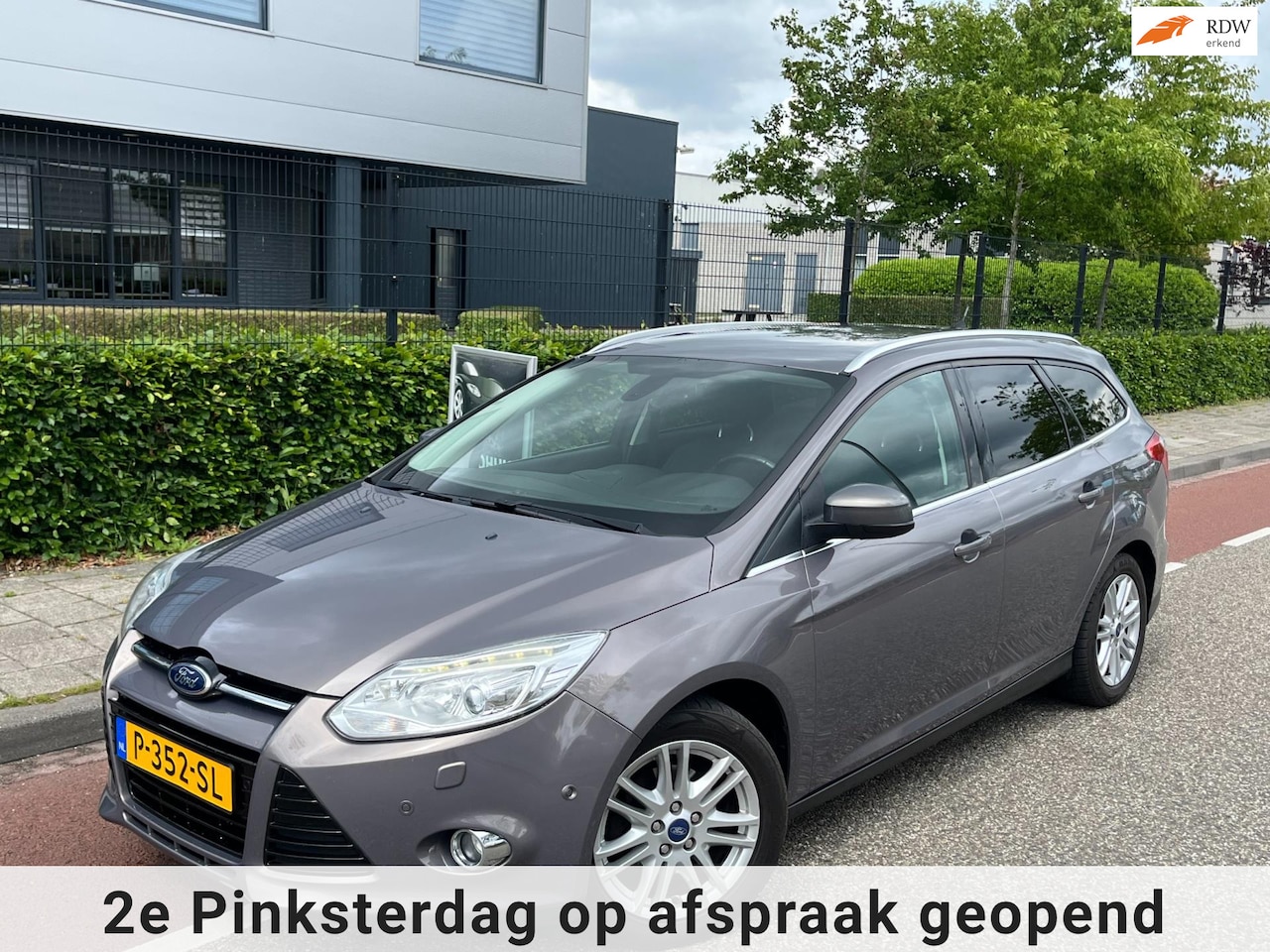 Ford Focus Wagon - 1.0 EcoBoost Titanium Cruise/Climate-control stoel/vrw pakeersensor - AutoWereld.nl