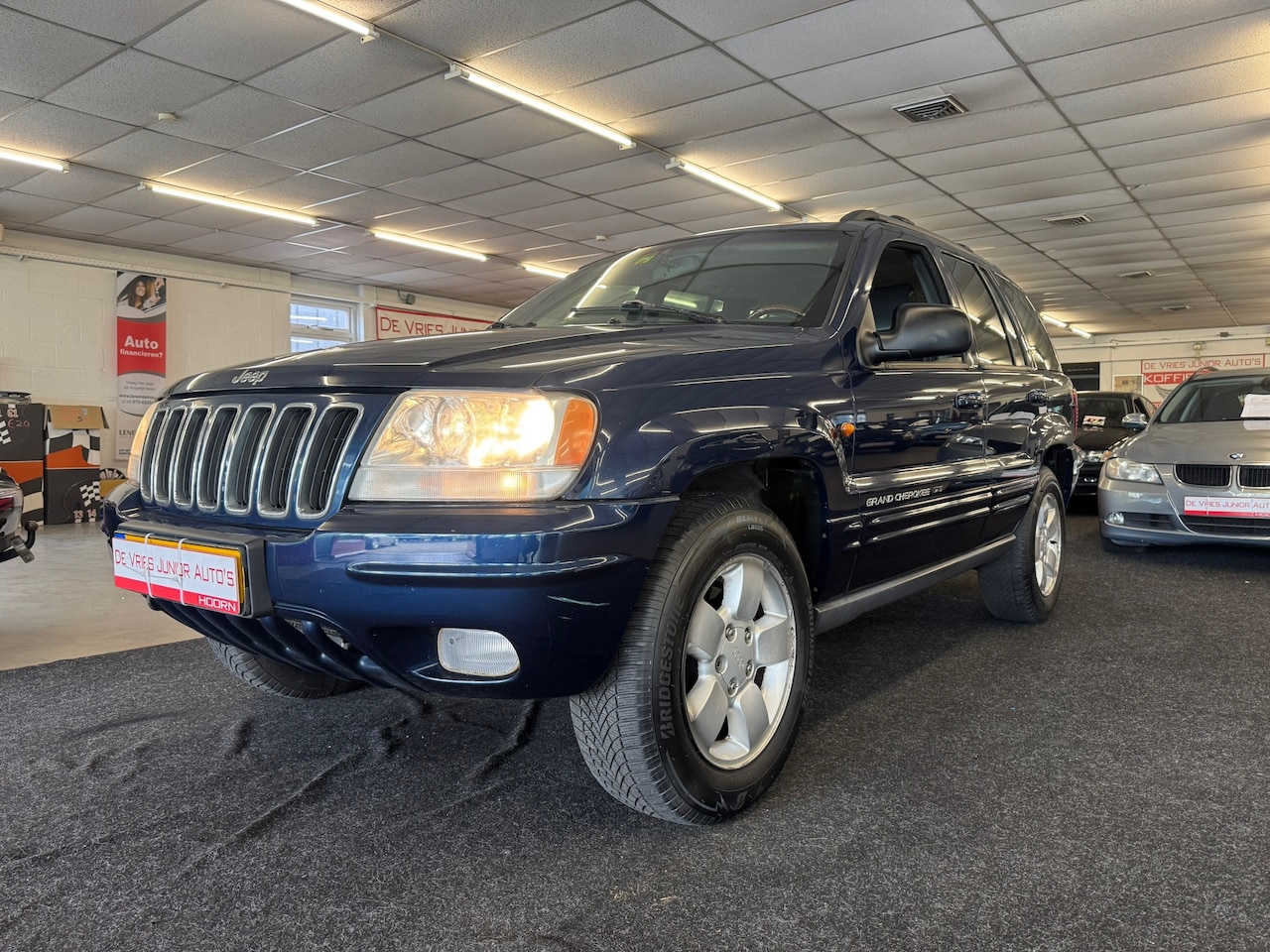Jeep Grand Cherokee - 4.7i V8 Limited 4X4. AUTOMAAT, LEER, TREKHAAK en veel meer! - AutoWereld.nl