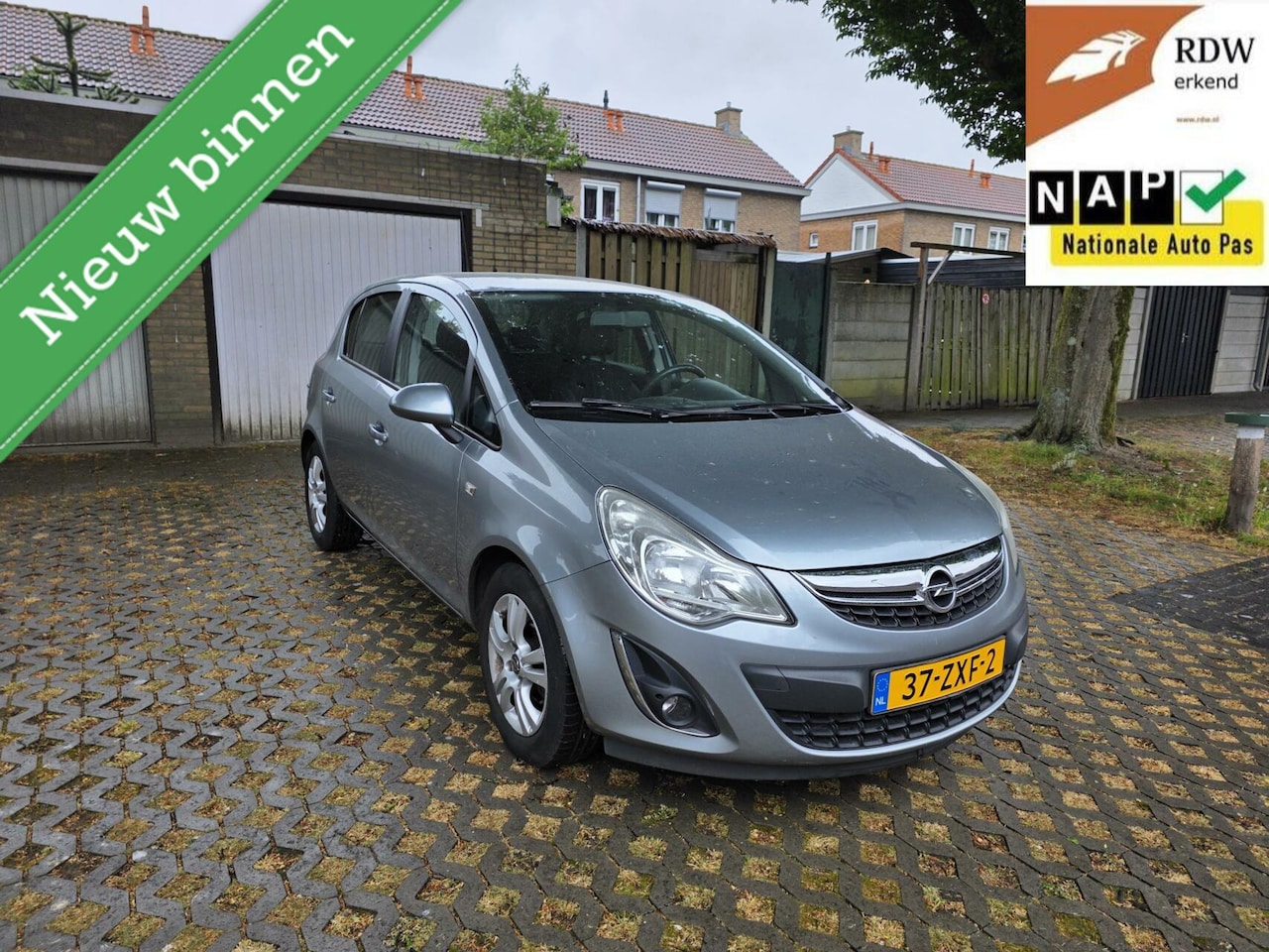 Opel Corsa - 1.2-16V FACELIFT 2013 5drs Airco/NAVI/PDC/APK - AutoWereld.nl