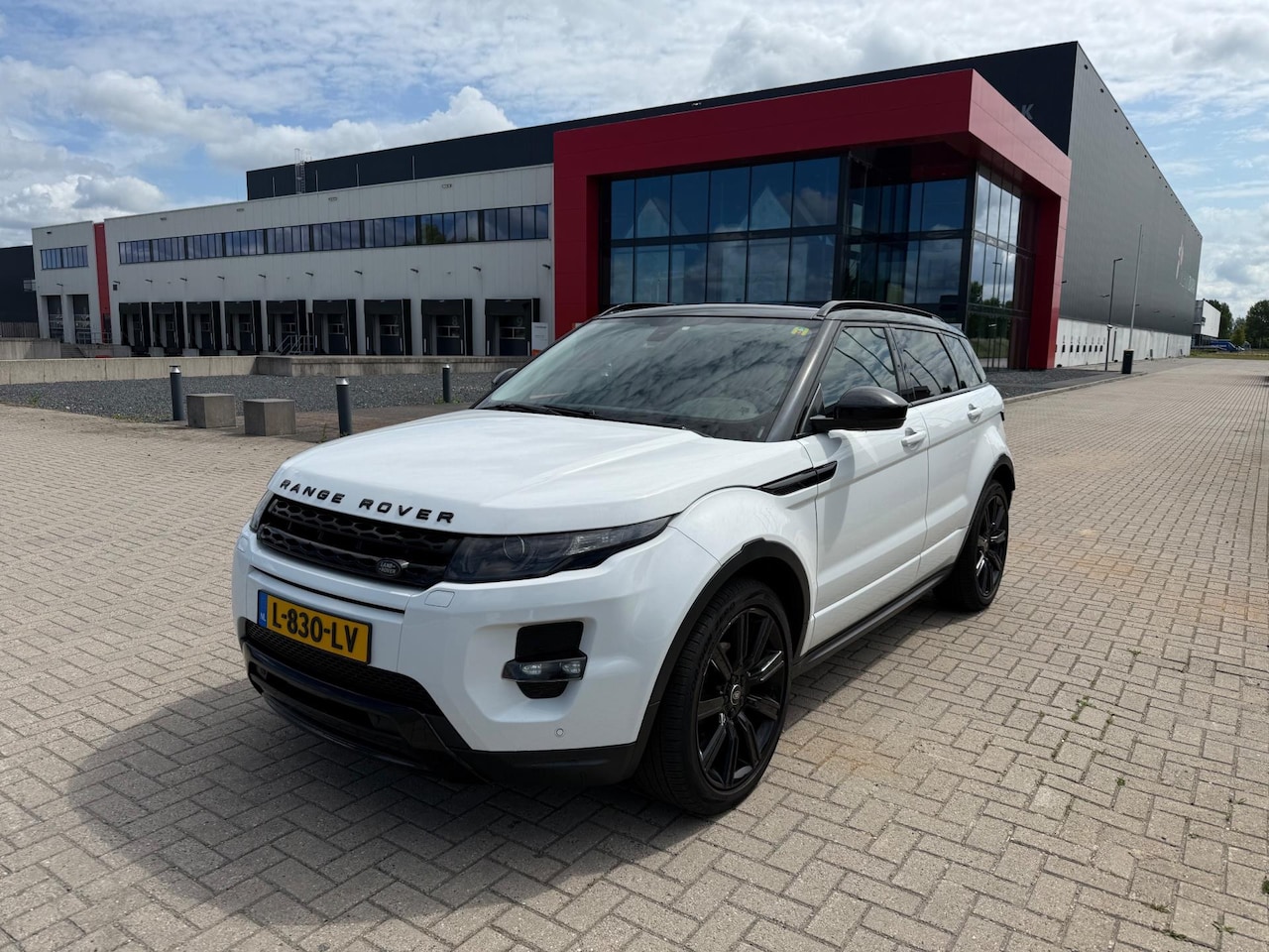 Land Rover Range Rover Evoque - 2.2 SD4 4WD Prestige PANO AUTOMAAT BOMVOL ALLE OPTIES WIT 2014 - AutoWereld.nl