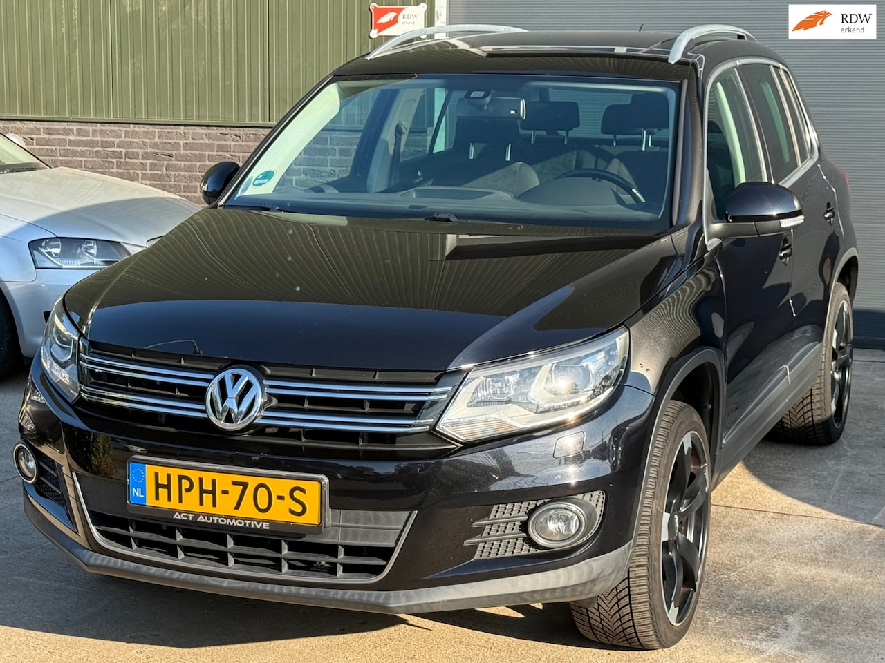 Volkswagen Tiguan - 2.0 TSI Sport&Style 4Motion DSG - AutoWereld.nl