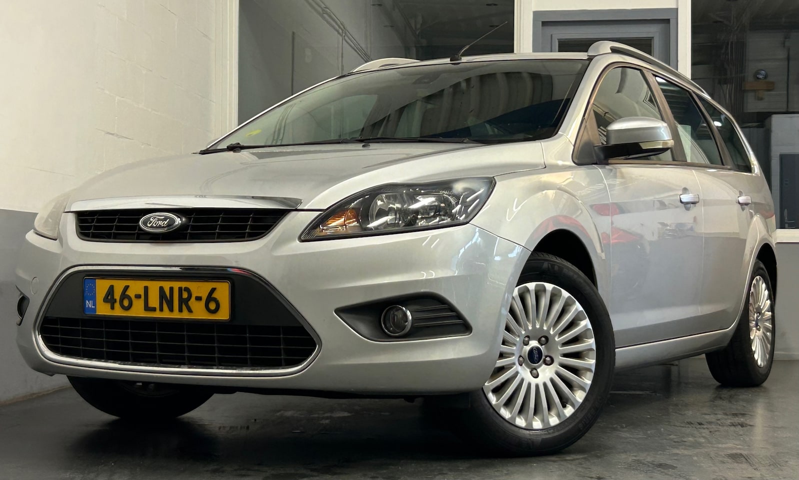 Ford Focus Wagon - 1.8 Limited Flexi Fuel|APK03-26|NAP|Cruise|Navi|Airco|Trekhaak - AutoWereld.nl